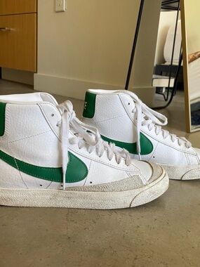 Nike White High-Top Sneakers with Green Swoosh